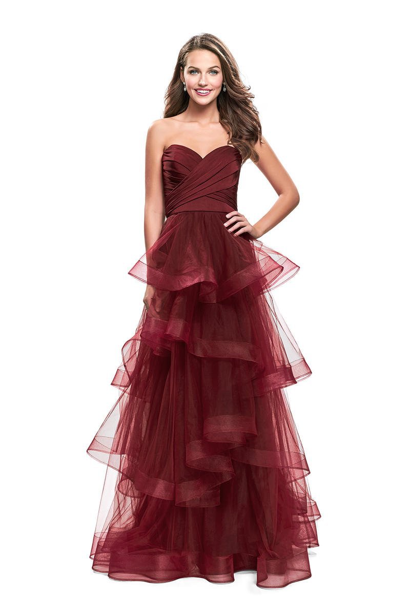 A Floral embroidered, strapless tulle dress with wine colored tulle fabric.