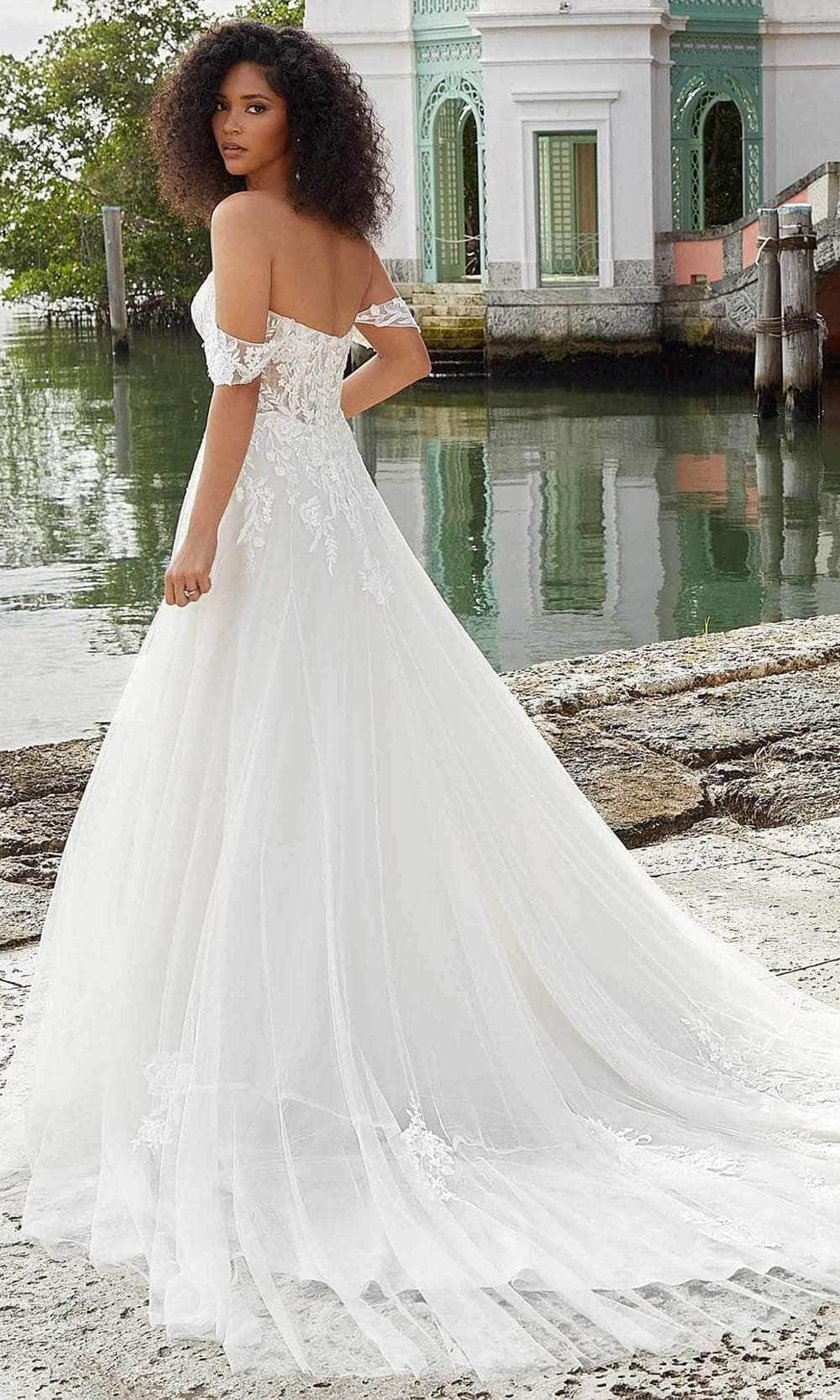 https://www.couturecandy.com/cdn/shop/products/mori-lee-bridal-6974-detachable-straps-bridal-gown-30805656371283.jpg?v=1658499173